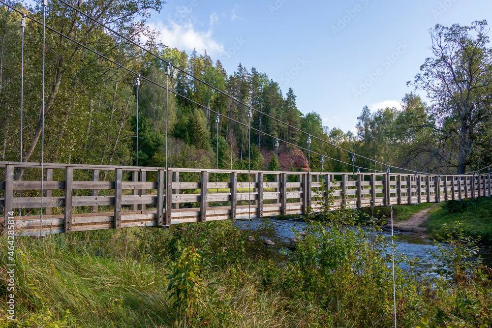 Suspension bridge above river Amata in the Gauja National Park, Latvia, Europe