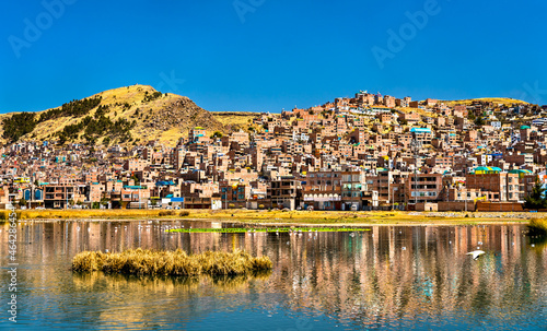 View of Puno from Lake Titicaca in Peru photo