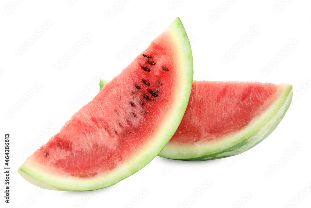 Slices of delicious ripe watermelon on white background