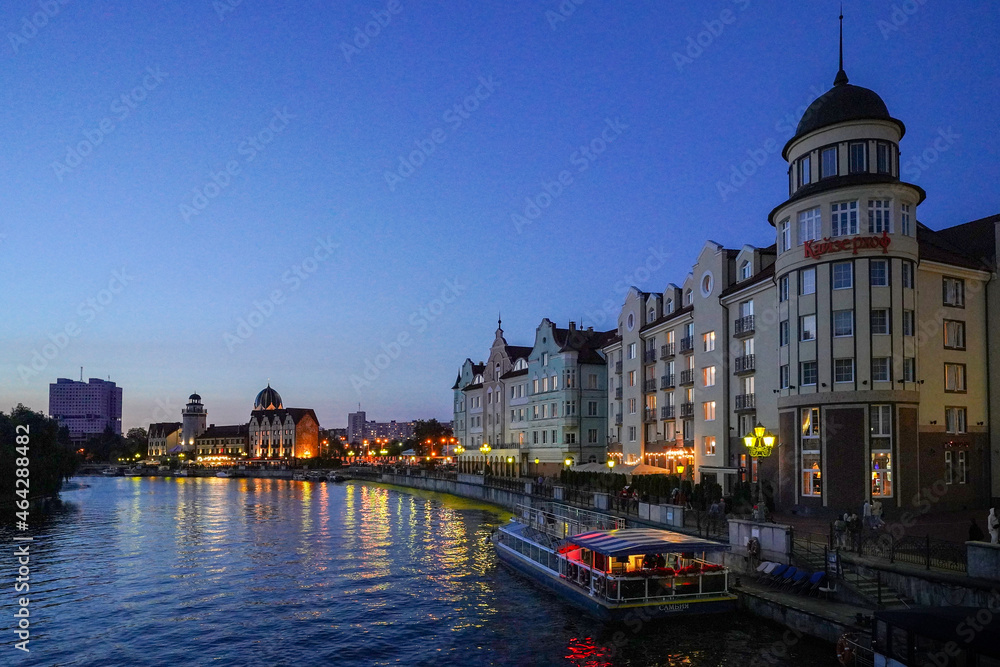 Obraz premium Kaliningrad. Koenigsberg. Night city. River shore. River tram