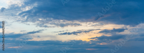 Blue sky with dark clouds during sunset © Volodymyr