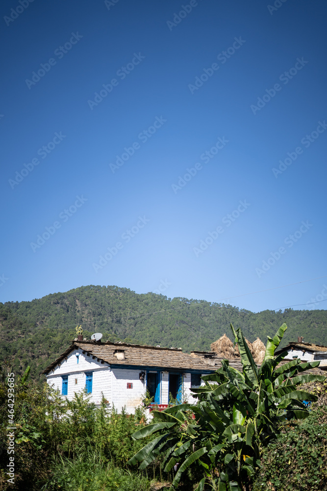 A traditional house situated in the mountains captured during daylight. A traditional house situated in almora. A traditional house situated in the mountains captured during daylight. A traditional house situated in almora.