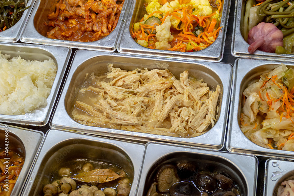 Pickled vegetables on self service restaurant counter or shop counter Pickled vegetables on self service restaurant counter or shop counter