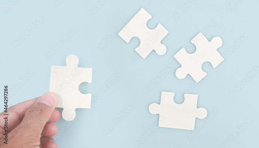 Connecting jigsaw puzzle . Business solutions success and strategy concept Connecting jigsaw puzzle . Business solutions success and strategy concept