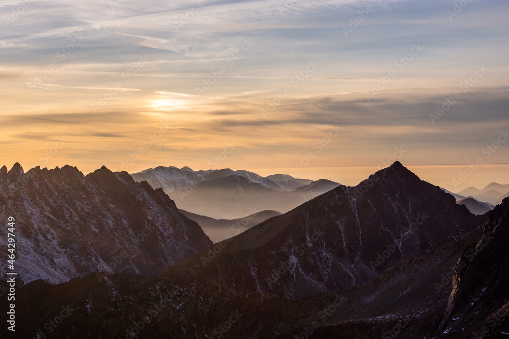 Sunset over iconic peaks of High Tatras mountains national park in Slovakia Sunset over iconic peaks of High Tatras mountains national park in Slovakia