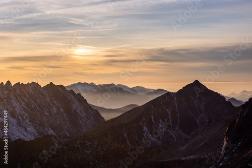 Sunset over iconic peaks of High Tatras mountains national park in Slovakia © jamexnik