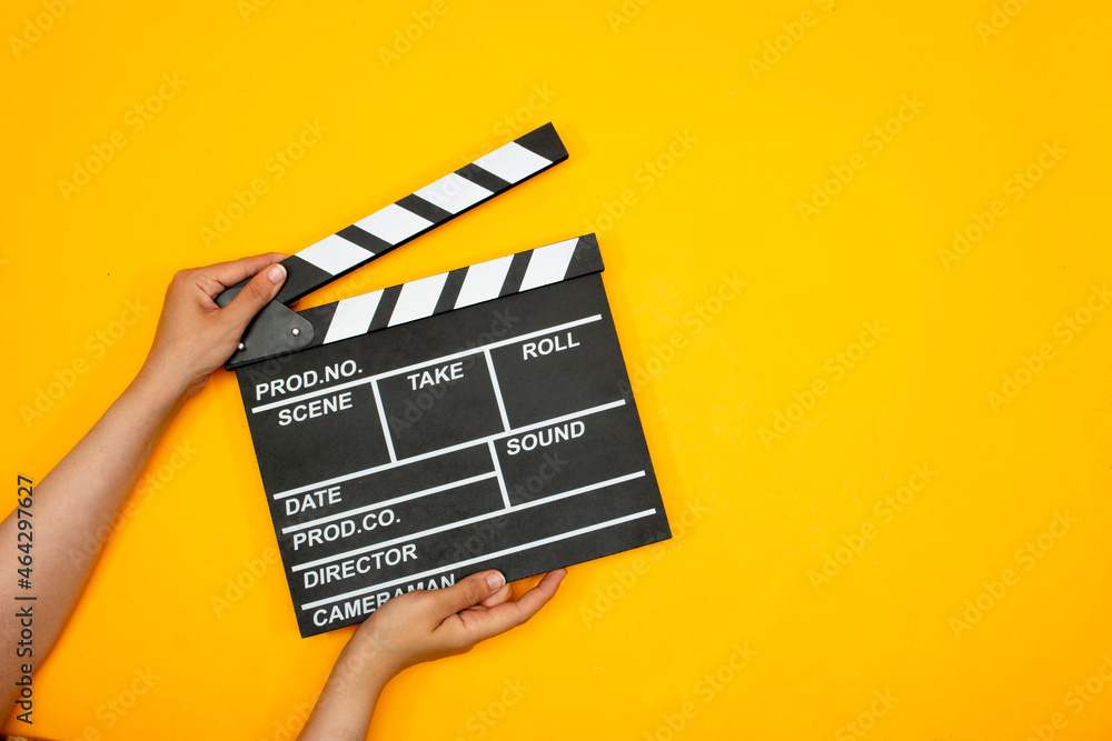 movie clapper a on yellow background