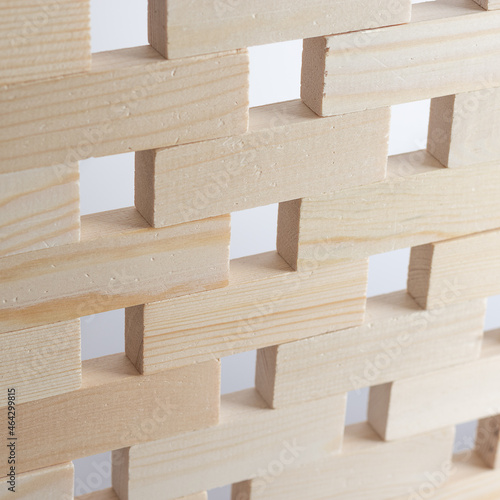 Close-up of a wooden Jenga block. Fall prevention