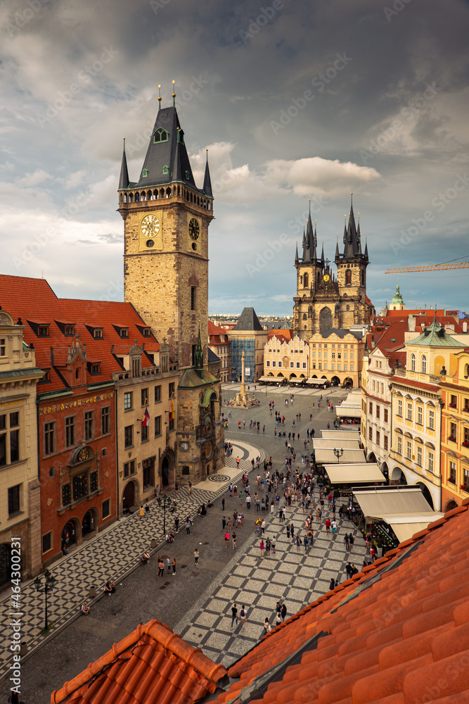 Prague, Czech Republic - 2021: Amazing sunset with top aerial view to the Old Town Square in this beautiful landmark of Europe. Astronomical Clock in the photo. Travel photography.