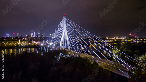 Night panorama of Warsaw from above, Siekierkowski bridge and downtown, photo from the drone, May 2017, Warsaw, Poland.