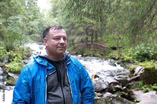 Portrait of man in park valley of waterfalls