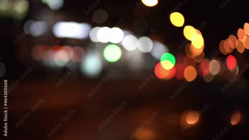 Blurred abstract bokeh of city night light background on a beautiful evening street in Moscow. Nightlife with bus and cars out of focus. Street. City. Urban scene. Defocused Blurred abstract bokeh of city night light background on a beautiful evening street in Moscow. Nightlife with bus and cars out of focus. Street. City. Urban scene. Defocused