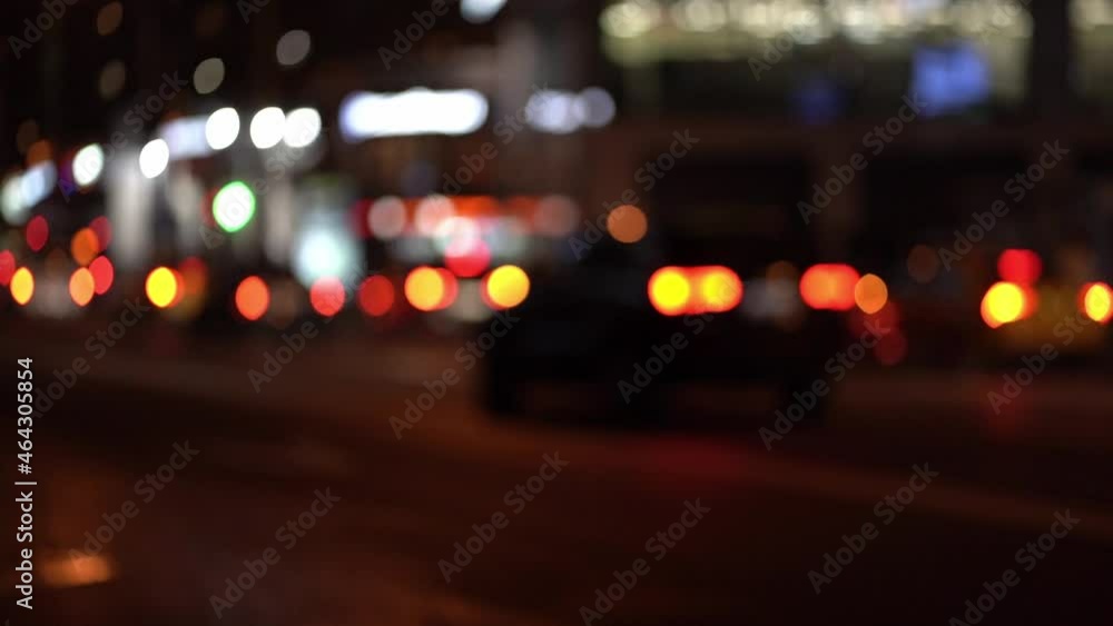 Blurred abstract bokeh of city night light background on a beautiful evening street in Moscow. Nightlife with bus and cars out of focus. Street. City. Urban scene. Defocused Blurred abstract bokeh of city night light background on a beautiful evening street in Moscow. Nightlife with bus and cars out of focus. Street. City. Urban scene. Defocused