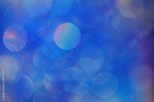 Abstract blue and white crystal balls hanging and falling with light shadows