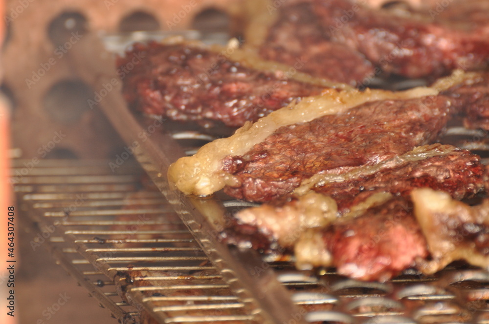 Brazilian barbecue with a grilled picanha, traditional Brazilian cut. Steak.