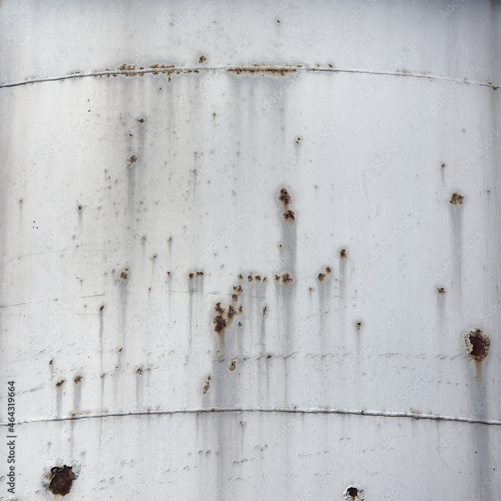 Old rusty metal background. Thrown industry tanks texture