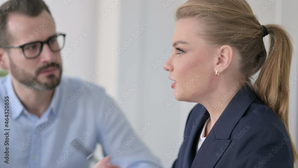 Close up of Businesswoman talking to Businessman Close up of Businesswoman talking to Businessman