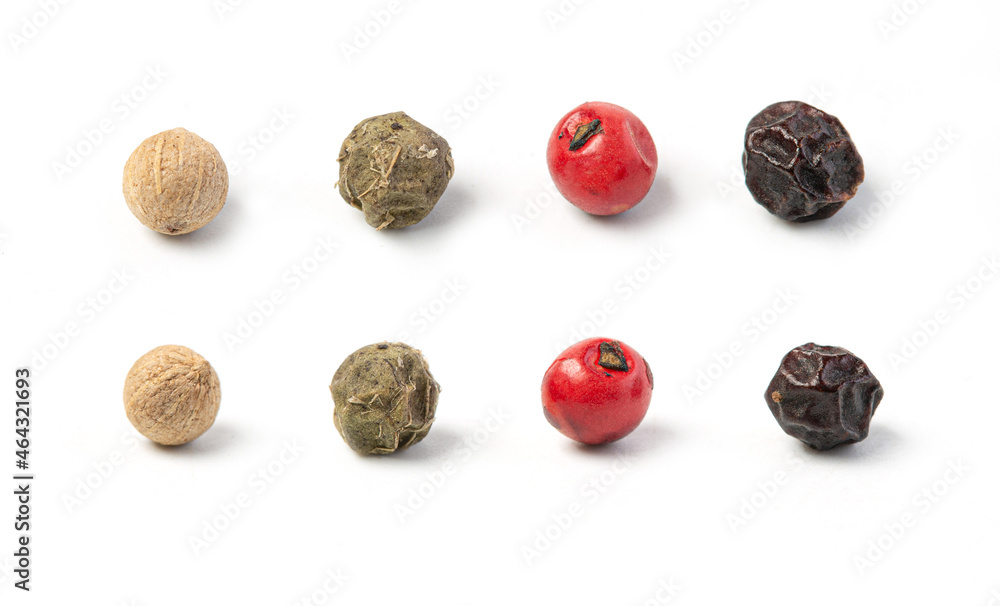 Obraz premium White, red and black peppercorns isolated.
