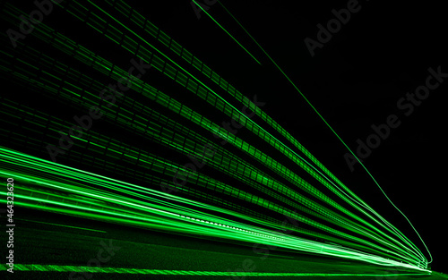 green lights of cars with night. long exposure