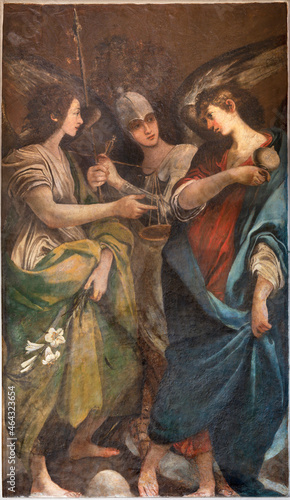 ROME, ITALY - AUGUST 29, 2021: The painting of Three Archangels - Michael, Gabriel and Raphael in the church Basilica di san Crisogono by Giovanni da San Giovanni - Giovanni Mannozzi (1592 – 1636).