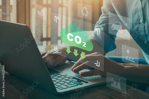 reduce CO2 emission concept with icons, global warming photo