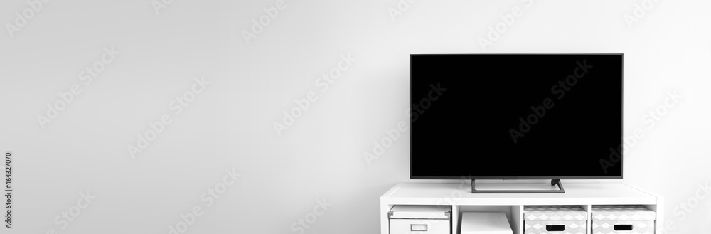 Lcd tv on white shef at modern room interior Lcd tv on white shef at modern room interior