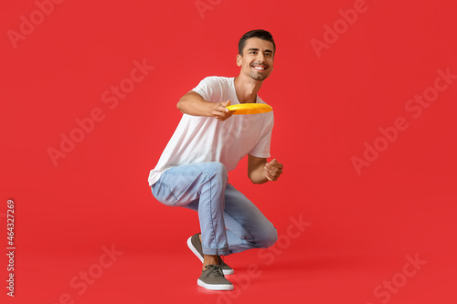 Handsome young man throwing...