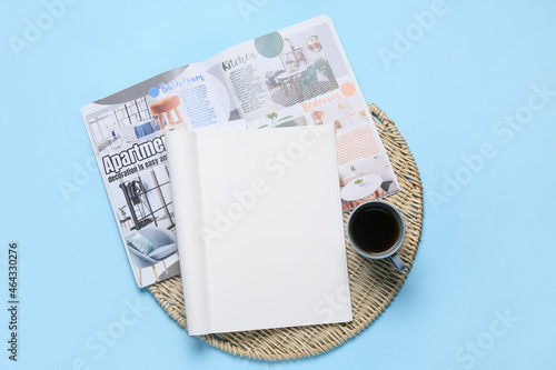Blank magazine with cup of ...