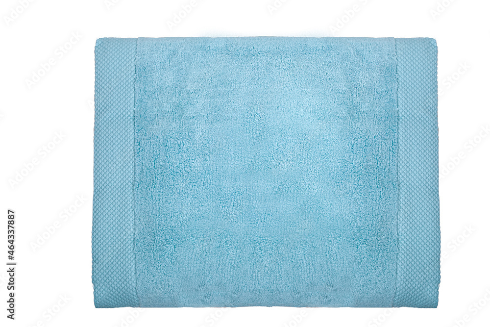 Light blue towel isolated on a white background. Light blue towel isolated on a white background.