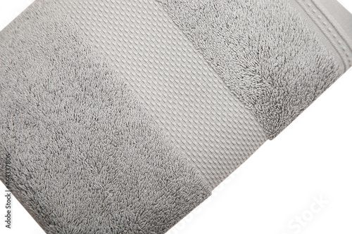 Gray towel isolated against white background.