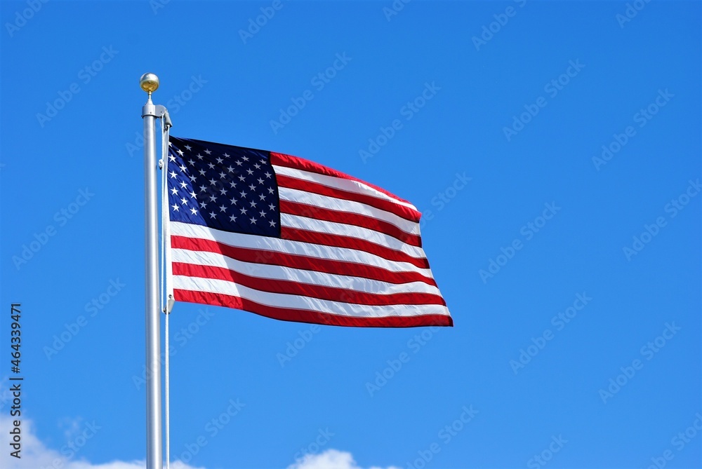 Fototapeta premium American Flag Waving in the Wind
