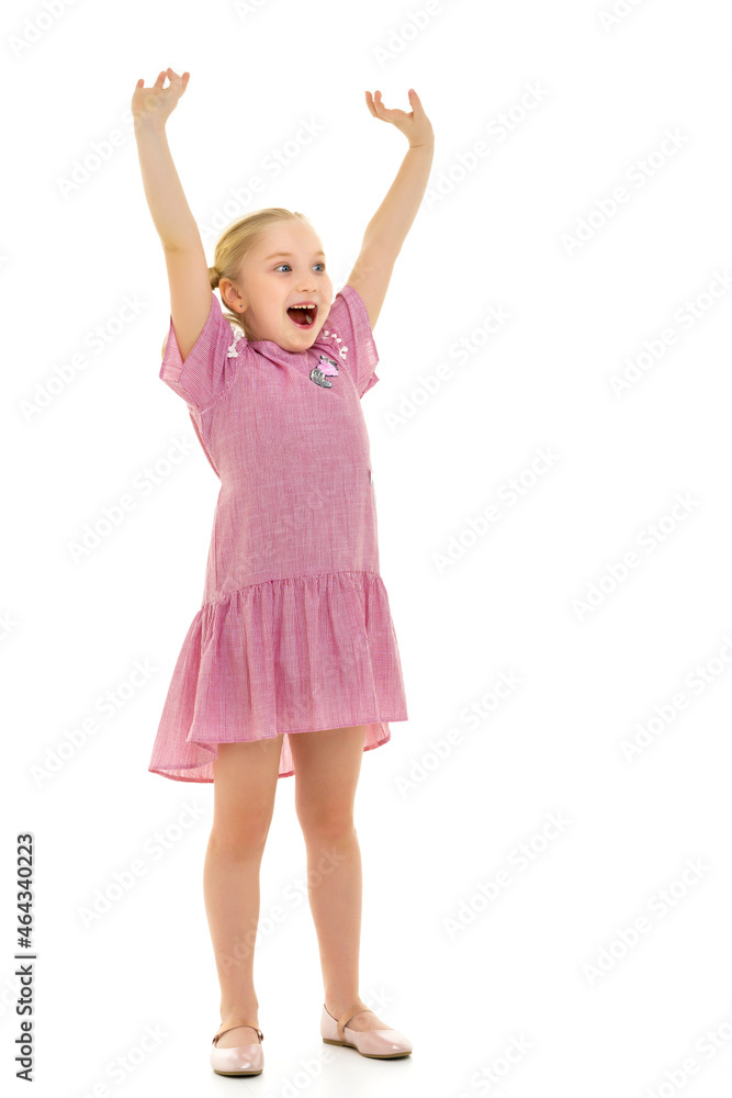 The little girl opened her mouth in surprise.Isolated over white The little girl opened her mouth in surprise.Isolated over white