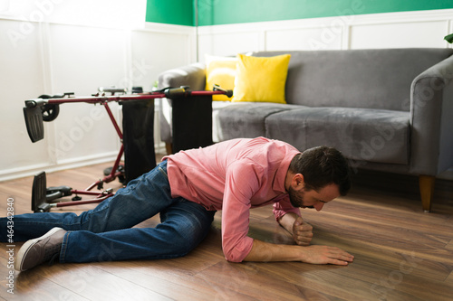 Canvas Print Injured man fell out of the wheelchair