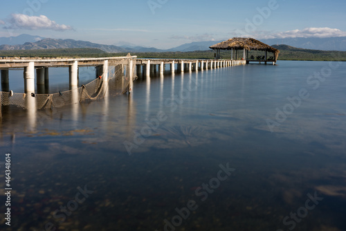 Wallpaper Mural Dramatic image of a pier on the Caribbean sea with long exposure and still calm waters. Torontodigital.ca