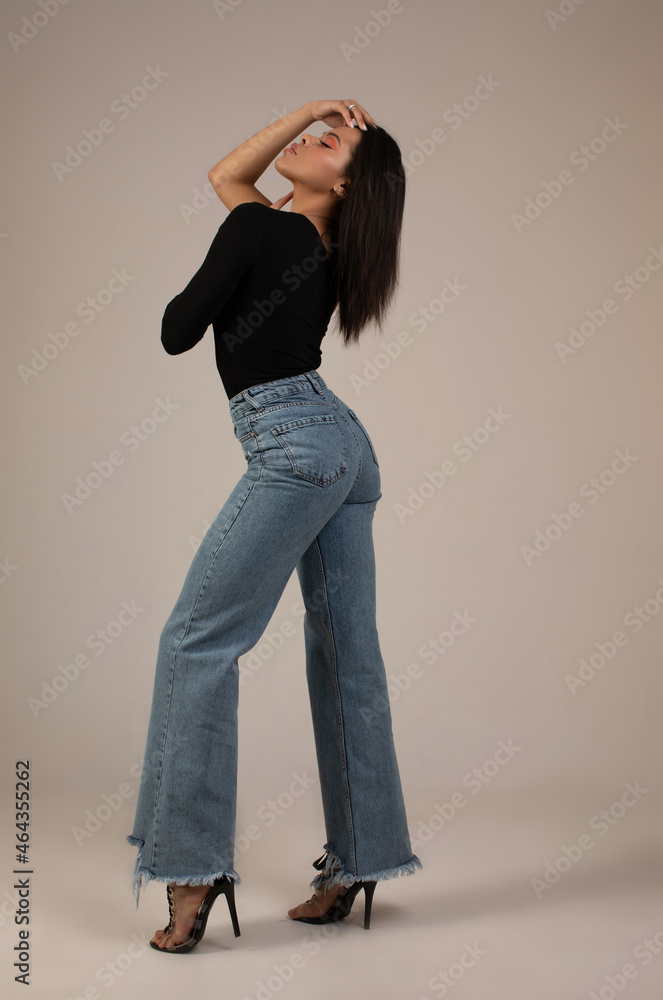 Black woman wear classic outfit isolated on grey background. Black woman wear classic outfit isolated on grey background.