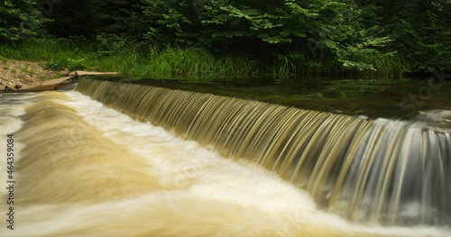 Ciecere river waterfall in summer day, Saldus, Latvia. photo