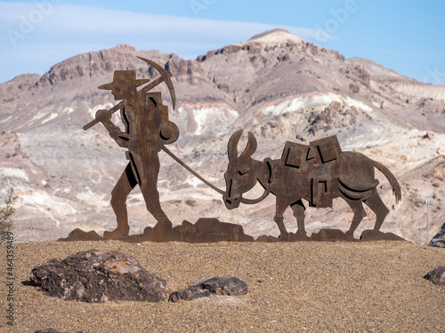 Metal Miner and Donkey statue at the entrance to Beatty Nevada as part of the Welcome sign.