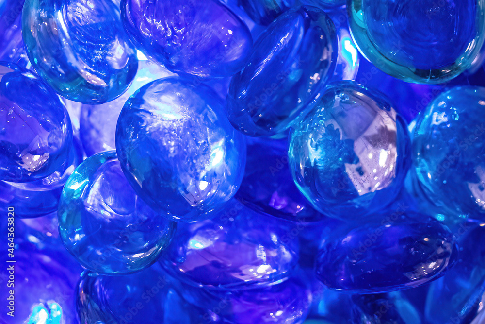 Close up blue shiny glass gem stones decoration