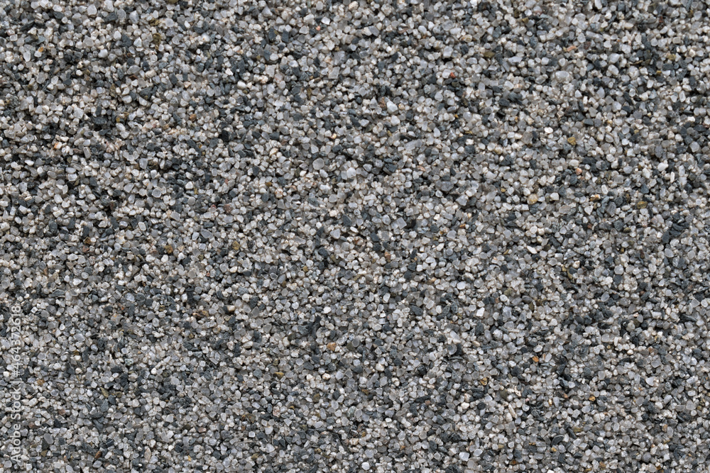 Fine gravel wall texture with different colored pieces Fine gravel wall texture with different colored pieces