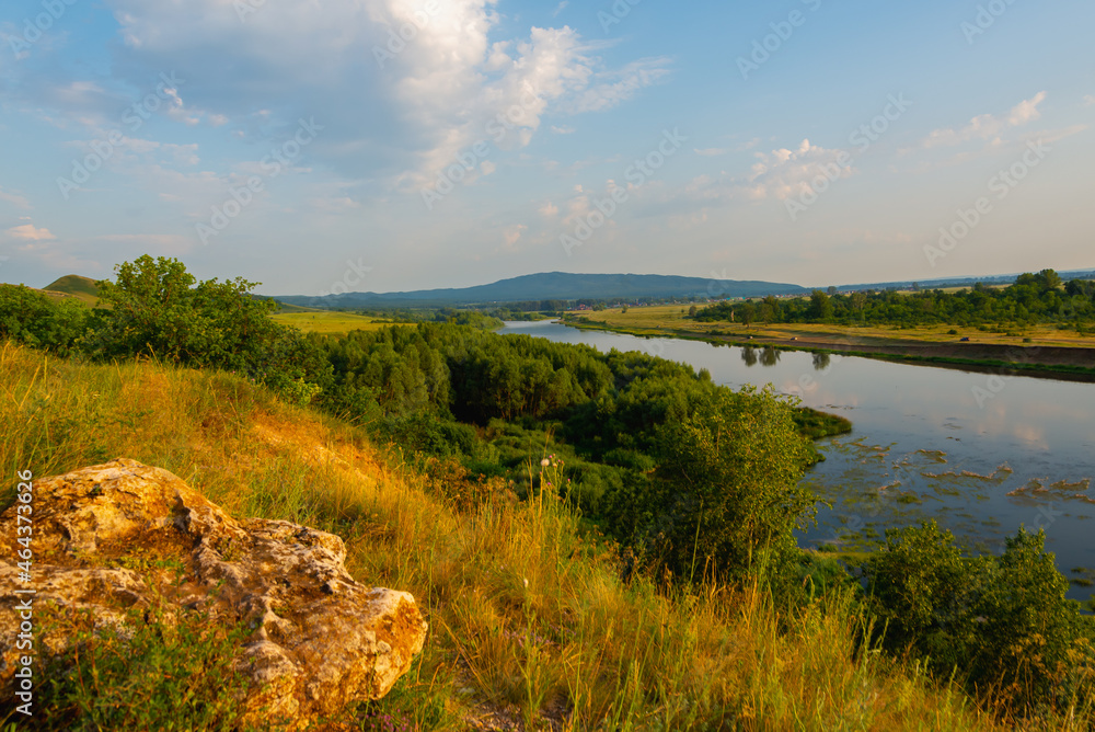 Obraz premium Forest, river and blue sky.