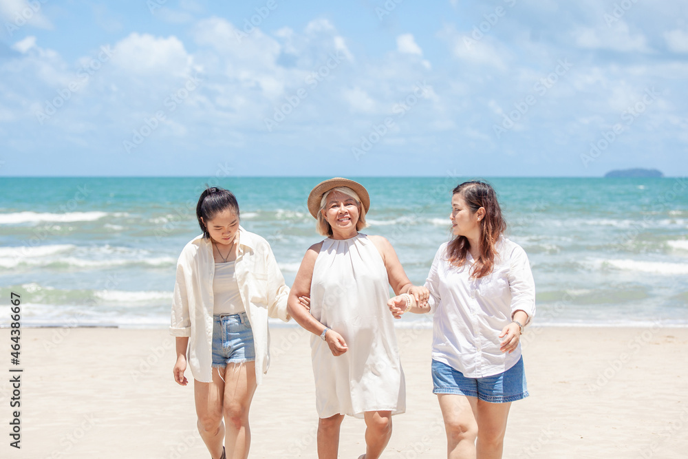 Happy family enjoying walk on the beach Happy family enjoying walk on the beach