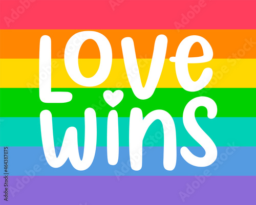 Love Wins - typography design on rainbow color background. Gay pride symbol.