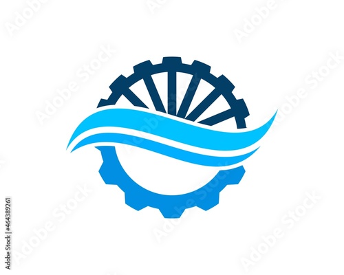 Water mill with gear and abstract beach wave inside