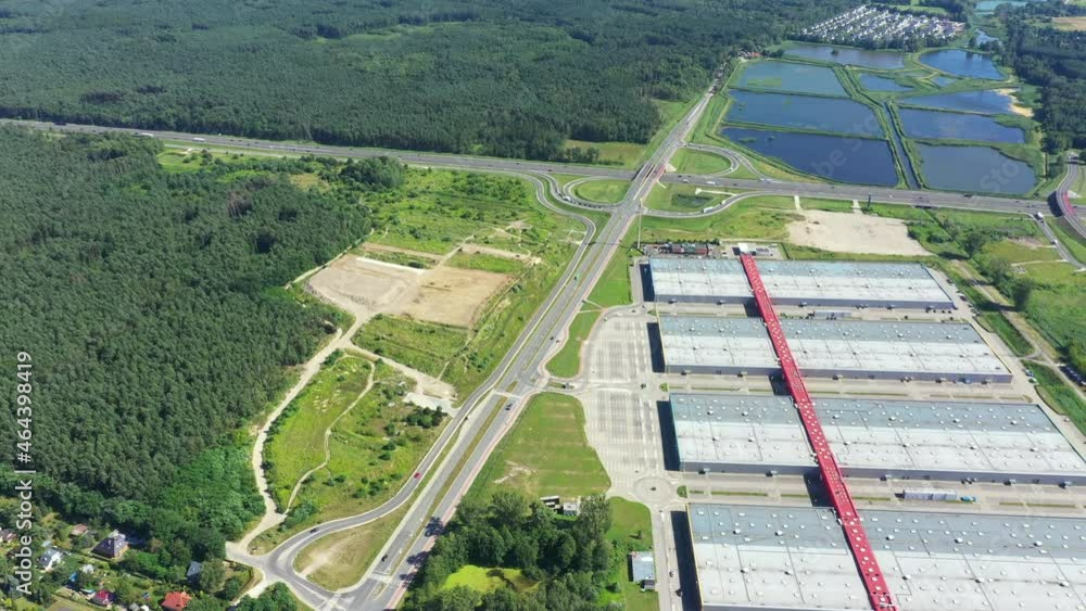 A huge shopping center and parking near it. view from above.aerial photography. Empty A huge shopping center and parking near it. view from above.aerial photography. Empty