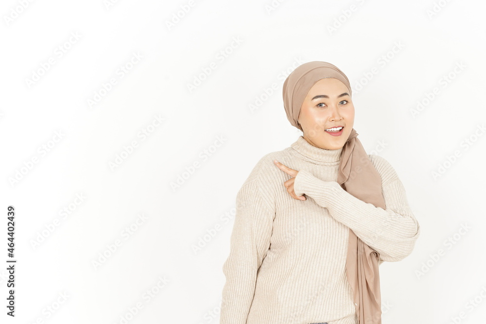 Presenting and Pointing Aside of Beautiful Asian Woman Wearing Hijab Isolated On White Background Presenting and Pointing Aside of Beautiful Asian Woman Wearing Hijab Isolated On White Background
