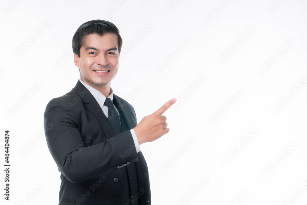 Portrait working Asian business man ware suit with happiness pointing finger to empty copy space , blank space for advertising or product isolated on white background - business concept Portrait working Asian business man ware suit with happiness pointing finger to empty copy space , blank space for advertising or product isolated on white background - business concept