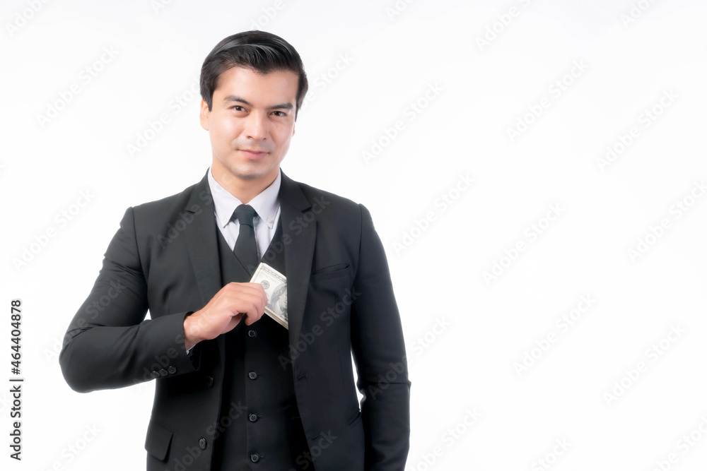 Business rich man trader wear a suit holding money US dollar bills in hand isolated on white background with copy space , concept for rich man business success , business trader concept Business rich man trader wear a suit holding money US dollar bills in hand isolated on white background with copy space , concept for rich man business success , business trader concept