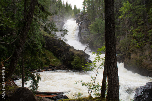 Shuswap Lake Provincial Park - Marine Site - Albas Falls. Powerful cascading waterfall in May, green lush cedar forest, hiking area
