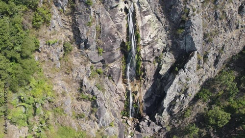 Frecha da Mizarela waterfall, Arouca in Portugal. Aerial top-down circling photo