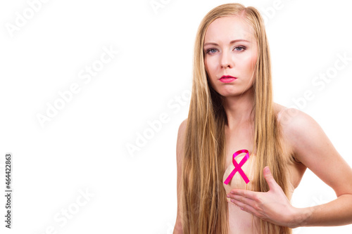 Woman chest in bra, pink cancer ribbon © Voyagerix